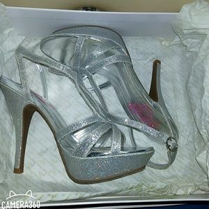 A pair of Sliver Glitter open-toe sandal heels